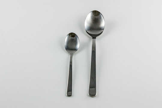 Steel cutlery with table spoon and little spoon