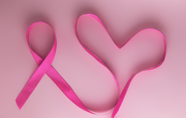Pink ribbon and Heart on pink background as symbol of female breast disease. Breast cancer month awareness tape. Minimalistic style. Top view. Flet lei. Place for text. Copy space. © tumana_net