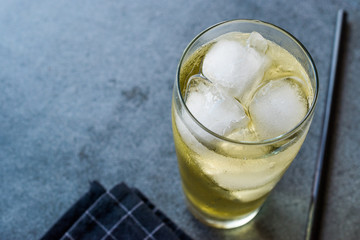 Vodka Energy Cocktail with Ice and Black Straw.