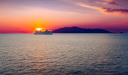Cruise ship at sunset. Gulf of Naples, Italy