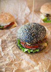 Black burger with thick beef meat
