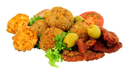 Tomato and basil arancini with sun dried tomatoes isolated on a white background