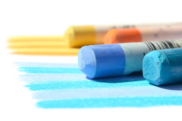 Set of dry pastels on white background selective focus