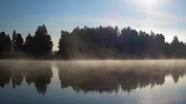 Fog flowing over the river