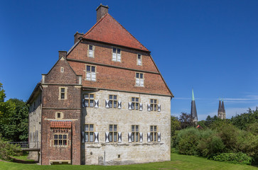 Fototapeta na wymiar Historical Kolvenburg and church towers of Billerbeck, Germany