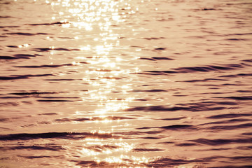 Reflections of sunlight on the surface of the sea water