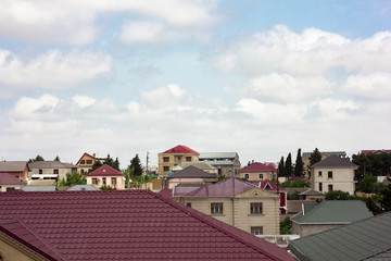 Obraz premium House roofs in the sky