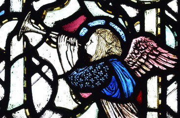 Detail of a cherub in a stained glass window