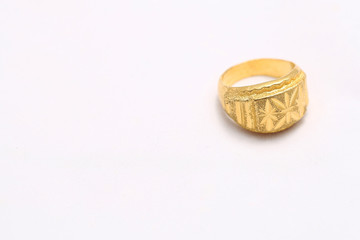 Beautiful gold ring on white background