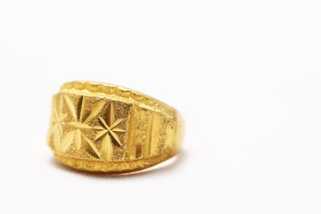 Beautiful gold ring on white background