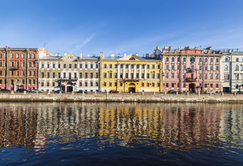 Fototapeta na wymiar Apartment houses on the Fontanka river embankment, St. Petersburg, Russia