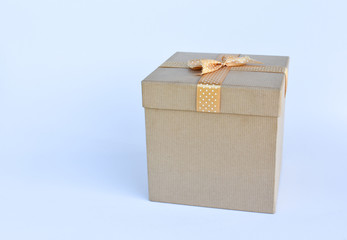 Box with bow on white background