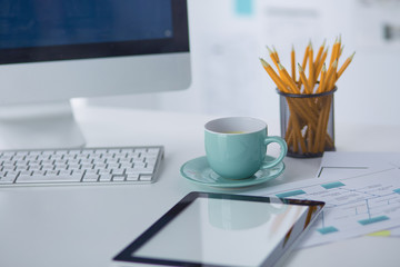 A cup of coffee on the office table