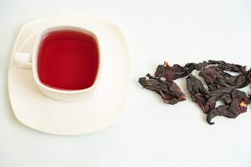 hibiscus on the red tea wooden floor