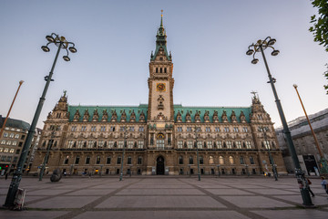 Fototapeta premium Hamburg City Hall is the seat of local government of the Free and Hanseatic City of Hamburg, Germany. Sunset.