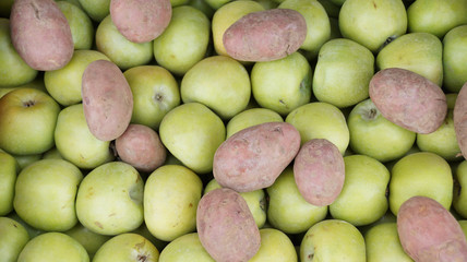 Potatoes and green apples