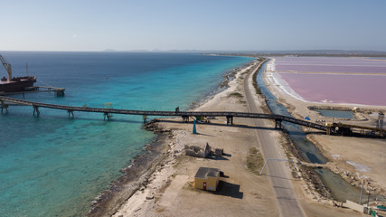 Obraz premium rose caribbean salt lake Bonaire island aerial drone top view