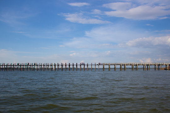 wooden bridge across irrawaddy river in mandalay, myanmar