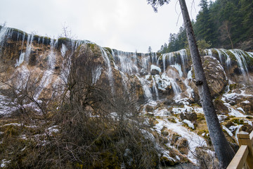 Waterfall from a cliff in the forest - 217312024