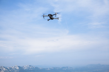Fototapeta na wymiar Drone flying over mountain