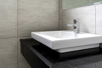 Bathroom interior with sink and faucet