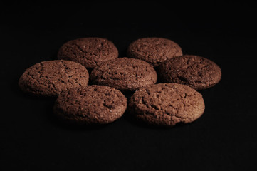 oatmeal cookies on a black table