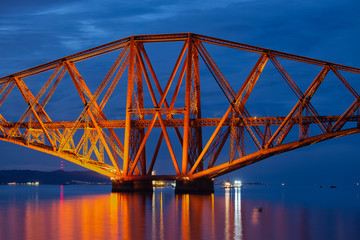 Naklejka na ściany i meble Evening view Forth Bridge, railway bridge over Firth of Forth near Queensferry in Scotland