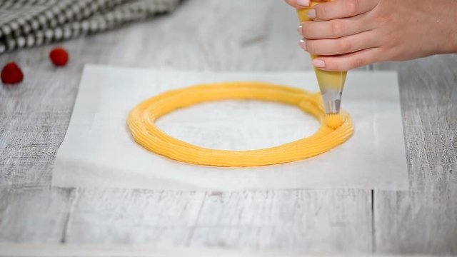 Eclair rings baking process. Making Paris Brest.