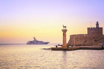 Fototapeten Lila Entrance to Port of Rhodes at first sunlight - Greece.   © tichr