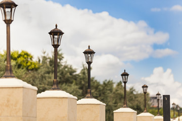 lanterns on the city embankment in the afternoon