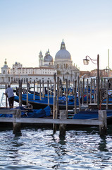 Santa Maria della Salute basilica with gondolas on the Grand canal in Venice, Italy