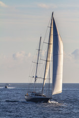 Sailboat sailing in the evening