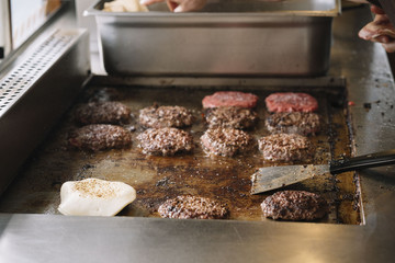 Making burgers in a fast food van