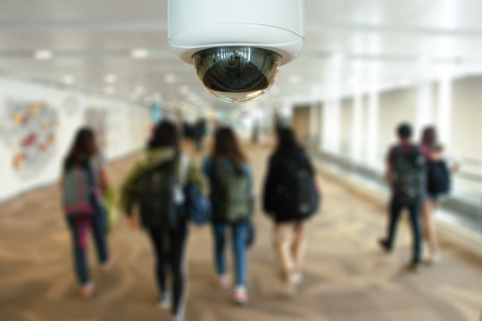 CCTV Security Monitoring With Blurred Background.Security Camera Surveillance For Watching And Protect Group Of People While Traveling At Airport Or Sabway Station