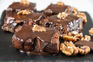 Chocolate raw vegan cake with nuts, figs and carob. Love for a healthy raw food concept.