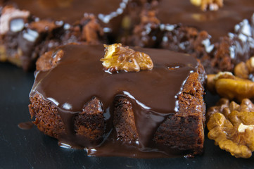 Chocolate raw vegan cake with nuts, figs and carob. Love for a healthy raw food concept.