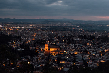 Fototapeta na wymiar Granada panoramic rooftop view at night