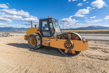 Steamroller doing road construction work