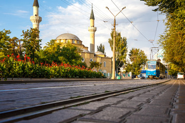 Fototapeta na wymiar blue tram rides around the city