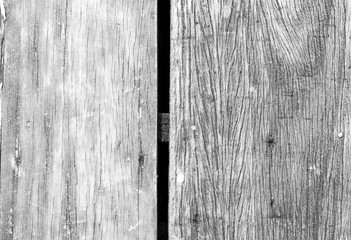 Fototapeta na wymiar Wooden floor of old style Thai house close up showing its beautiful pattern, black and white abstract photo