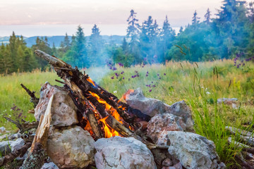 Outdoors Fire with Stone Hearth with Alps and Mont-Blanc Mountains in the Background