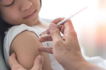 Vaccine HPV healthcare concept. Image of healthy Asia young adult kid girl getting vaccination with...