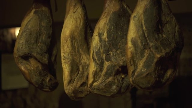 Spanish national delicacy humbug iberico close up. Traditional cheese dried pork ham serrano. Spain meat gammon. Jamon serrano.