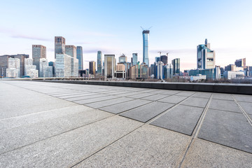 Obraz premium empty square with city skyline