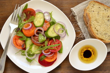 Colorful summer salad with fresh vegetables, top view