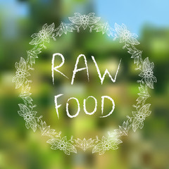 Raw food. Hand-sketched typographic elements on blured background
