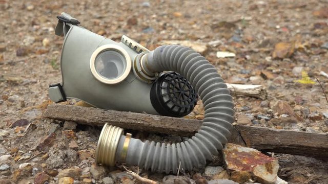 A gas mask on the ground - closeup