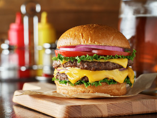 double cheese burger with beer - obrazy, fototapety, plakaty