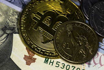 Crypto virtual currency Business finance concept, Close Up Shoot Of Golden Bitcoin and US dollar banknote & coins, Selective Focused. Electronic Money And Macro Finance Concept.