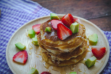 pancake strawberry avocado fruit and honey syrup sweet dessert on wood table pan cake dessert homemade